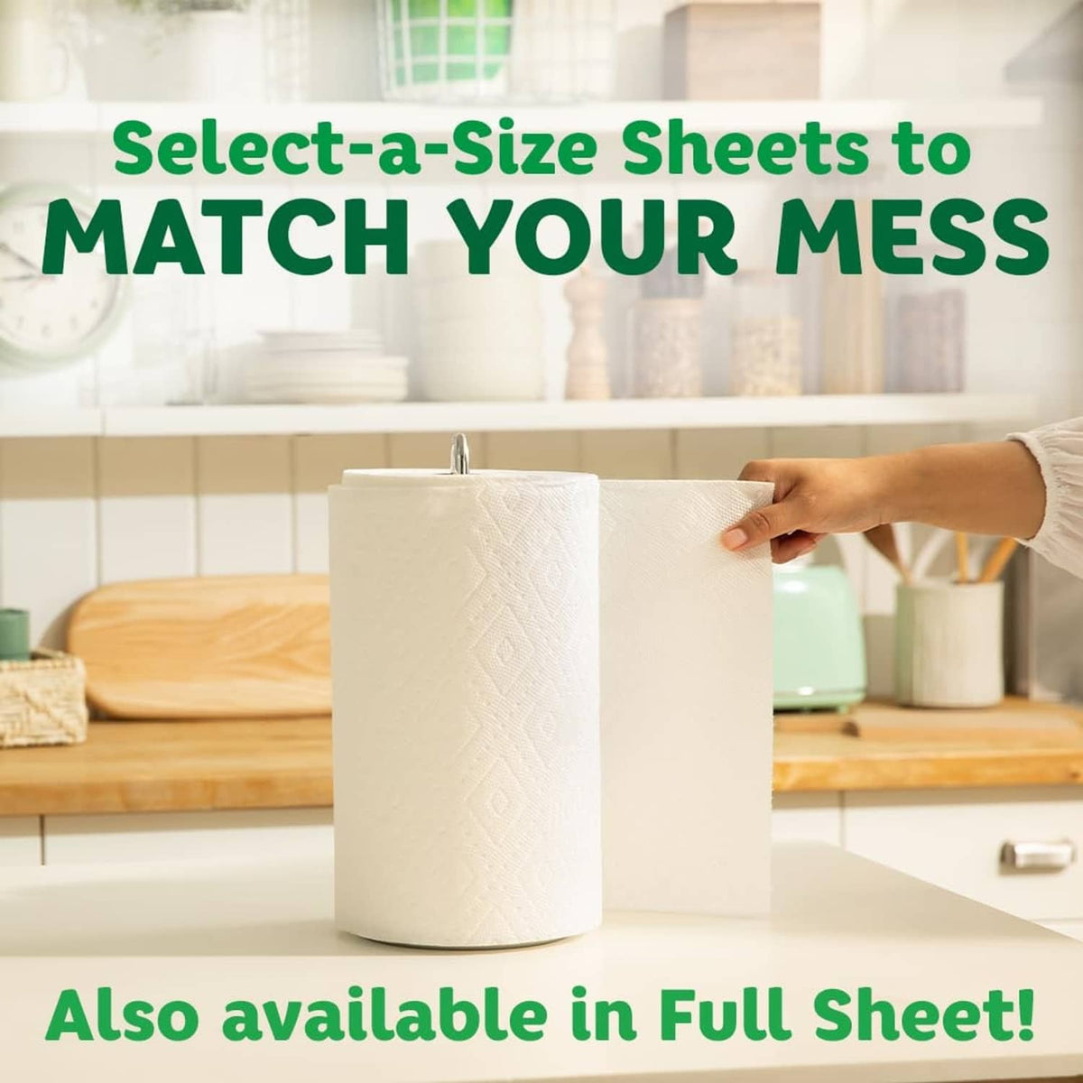 Single white paper towel roll being lifted with dispenser stand behind