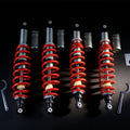 Set of off-road shock absorbers with red coil springs and silver dampers