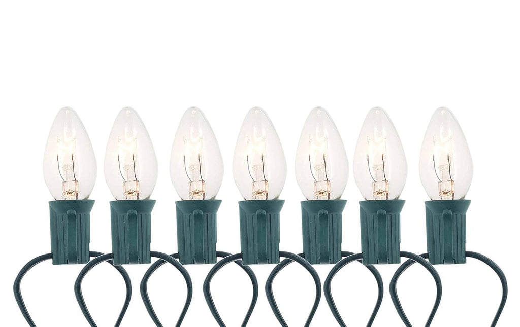 Mini clear bulbs on light string connected to white C7 replacement sockets