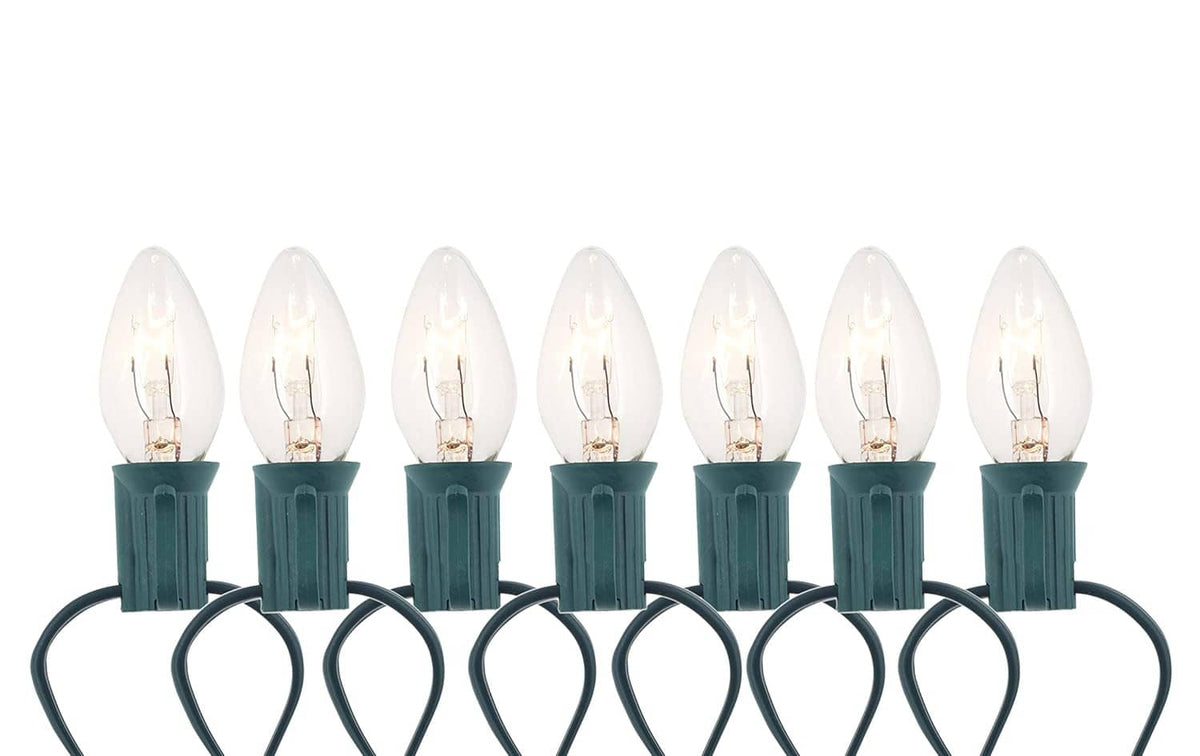 Mini clear bulbs on light string connected to white C7 replacement sockets