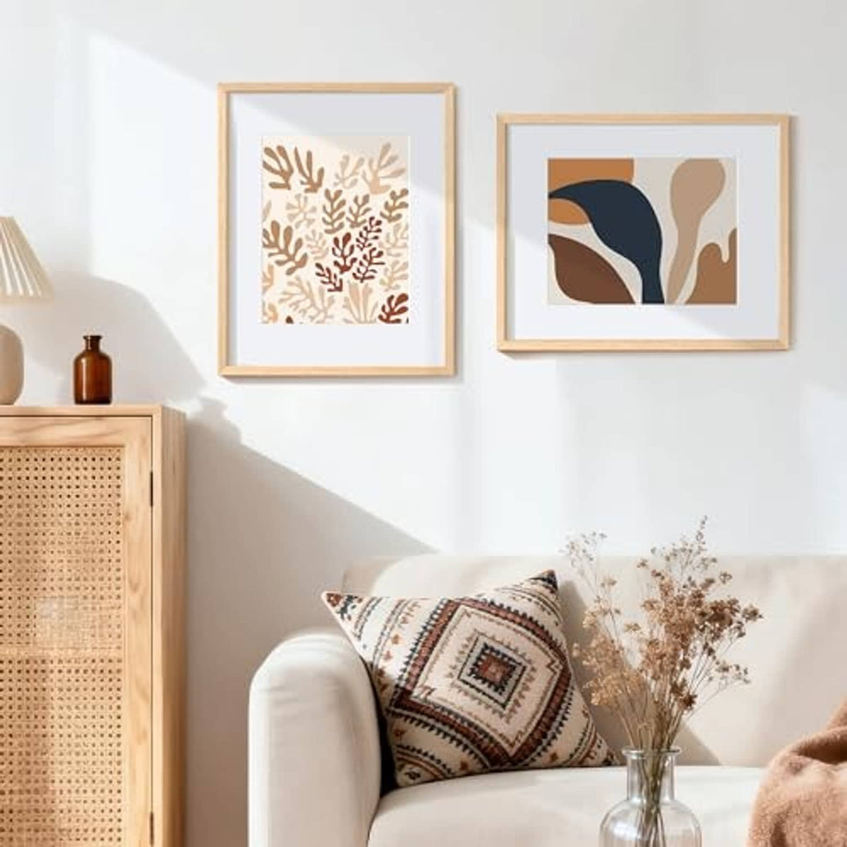 Natural wood picture frames on wall, two 16x20 openings with framed prints