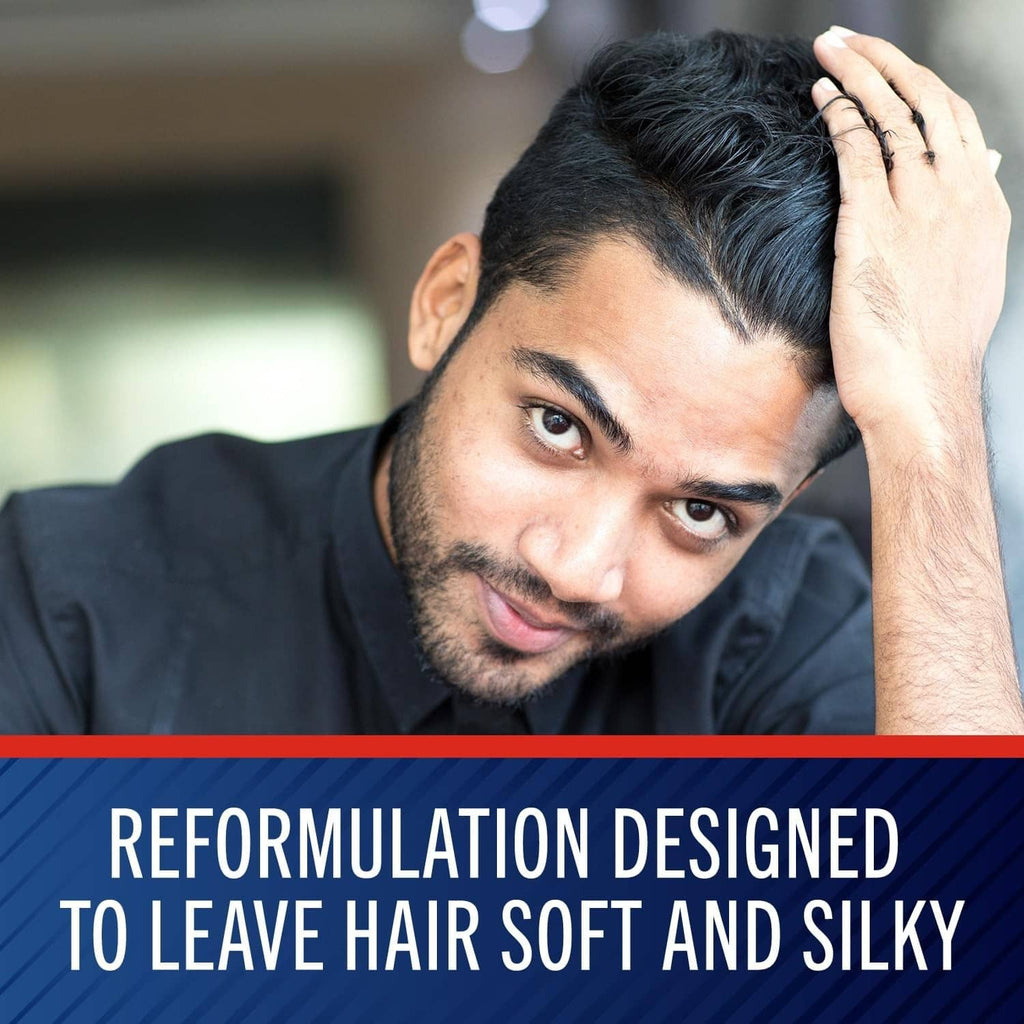 Anti-dandruff shampoo scalp care, man touching hair near temple