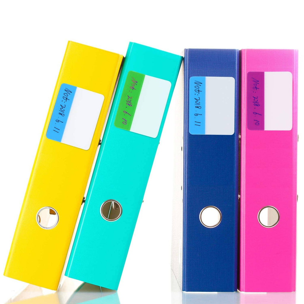 Set of sticky index tabs in yellow, teal, navy, and pink with label windows.