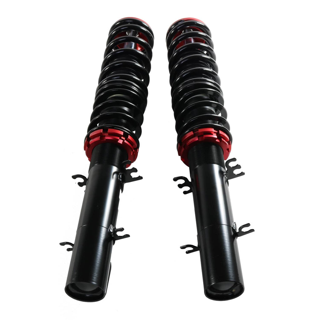 Pair of coilover shocks with black bodies, red collars, and metal spring coils