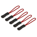 Set of black zipper pull tabs with red loop cords, non-slip textured ends