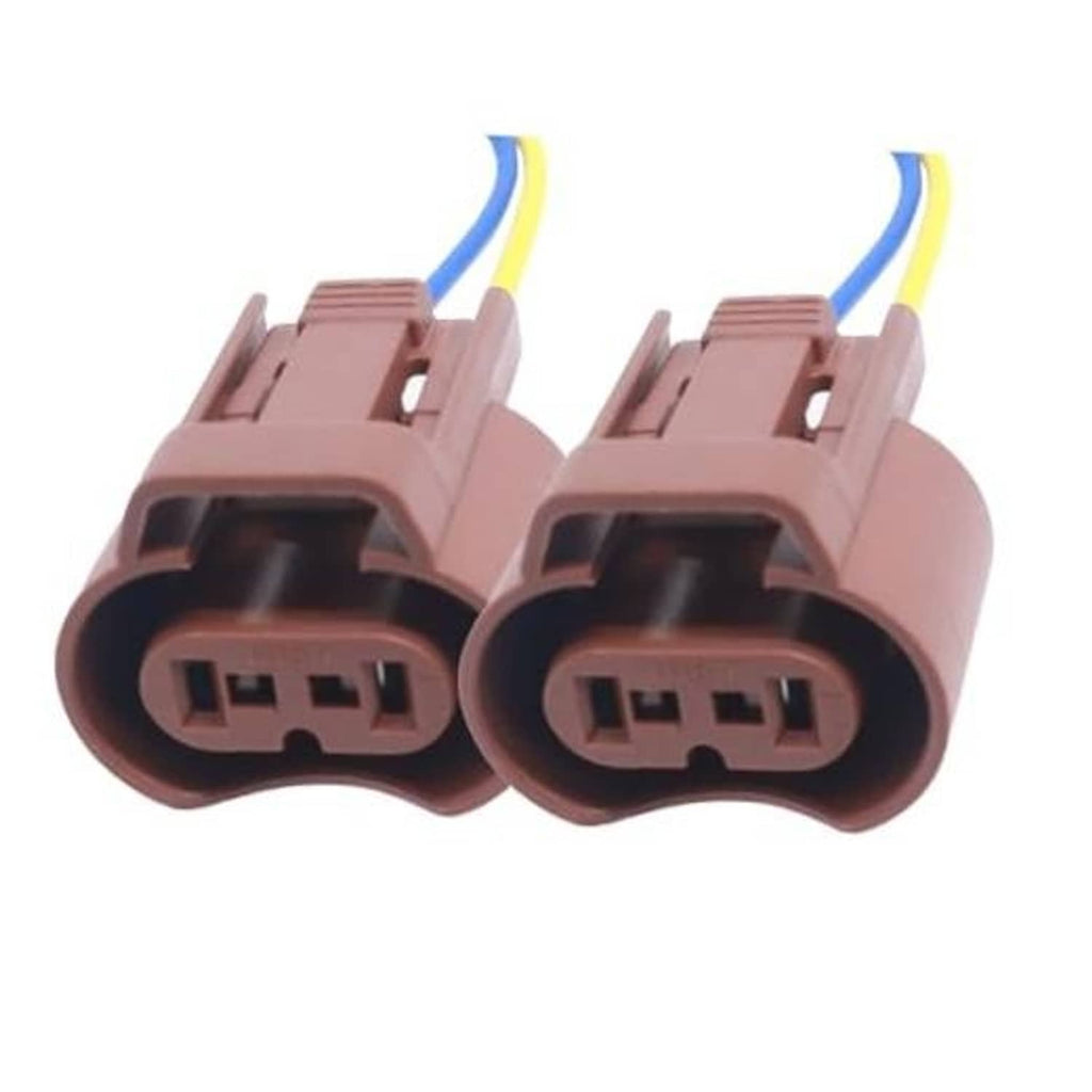 Pair of brown female headlight connector sockets with blue and yellow lead wires