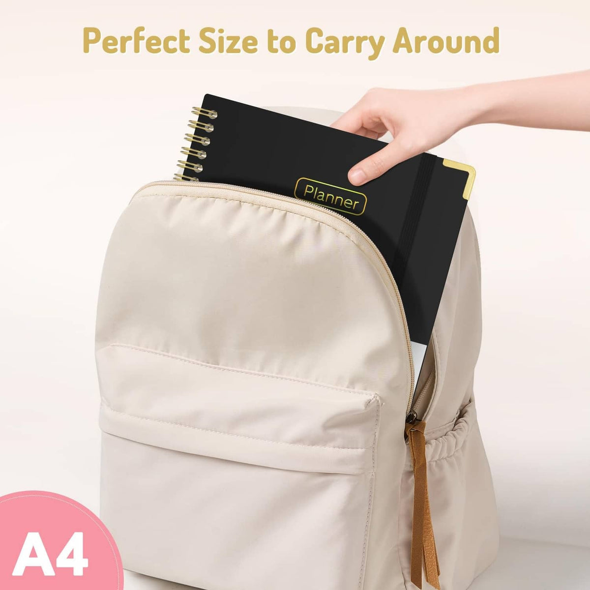 Planner inside a carrying pouch, black cover with Planner label and gold corner accents.
