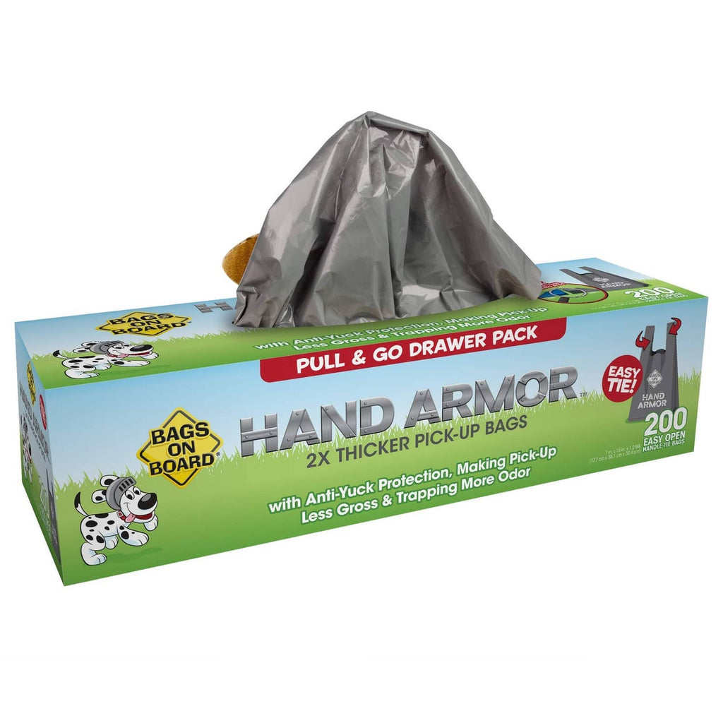 Extra-thick dog waste pickup bags in a green box with a pulled gray bag.