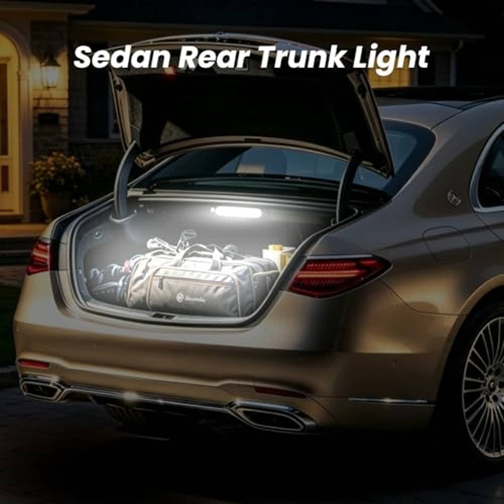 Rear trunk light illuminating cargo area in a sedan with open trunk