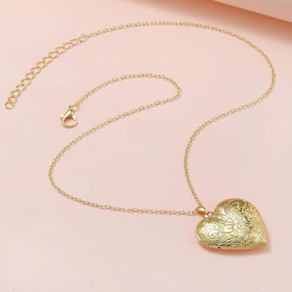 Gold heart photo locket pendant with engraved floral scrollwork, on link chain
