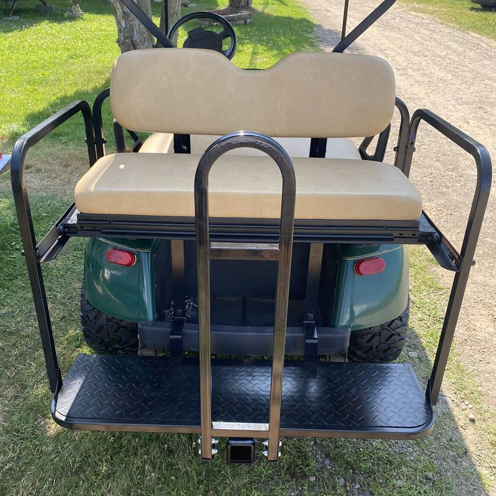 Rear view of black safety grab bar and metal footrest platform on golf cart