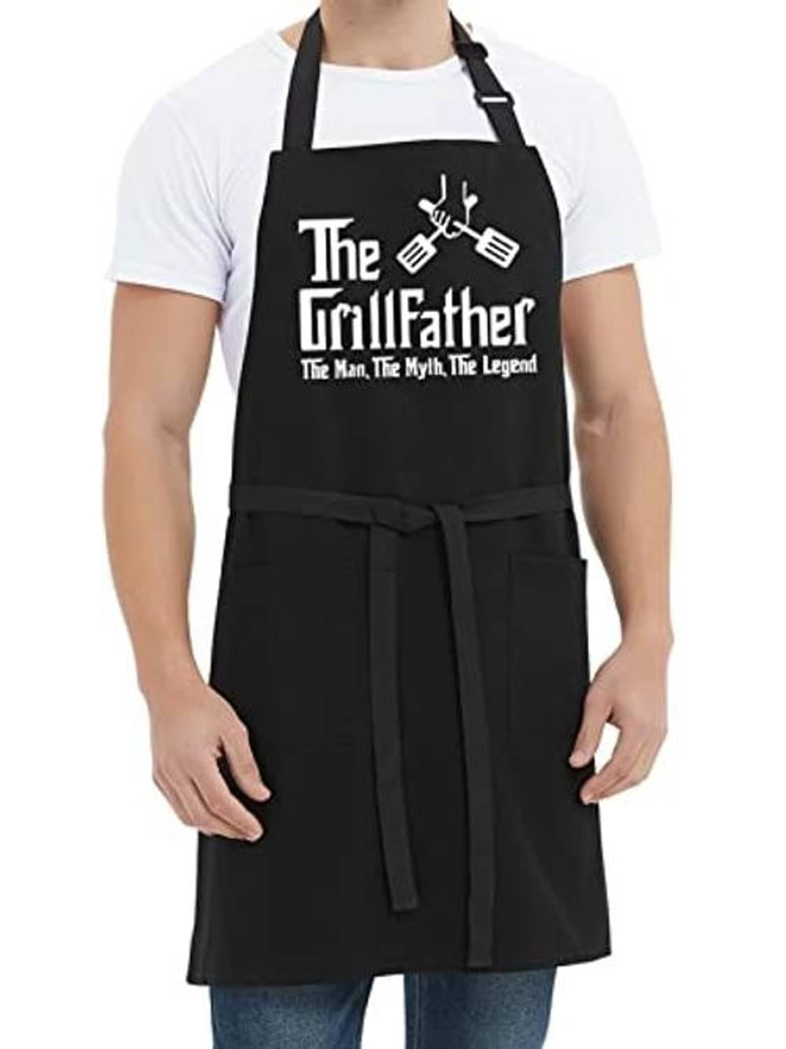 Black grill apron with “The Grillfather” graphic, front pockets, and waist tie
