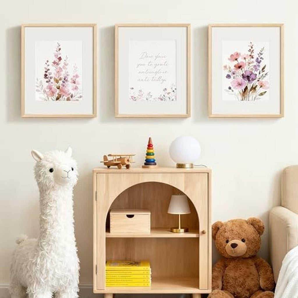 Three natural wood picture frames on wall above shelf, showing 16x20 openings