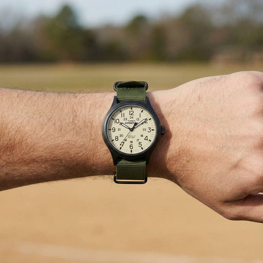 Men's wrist watch with round white dial and green strap; black case and hour markers