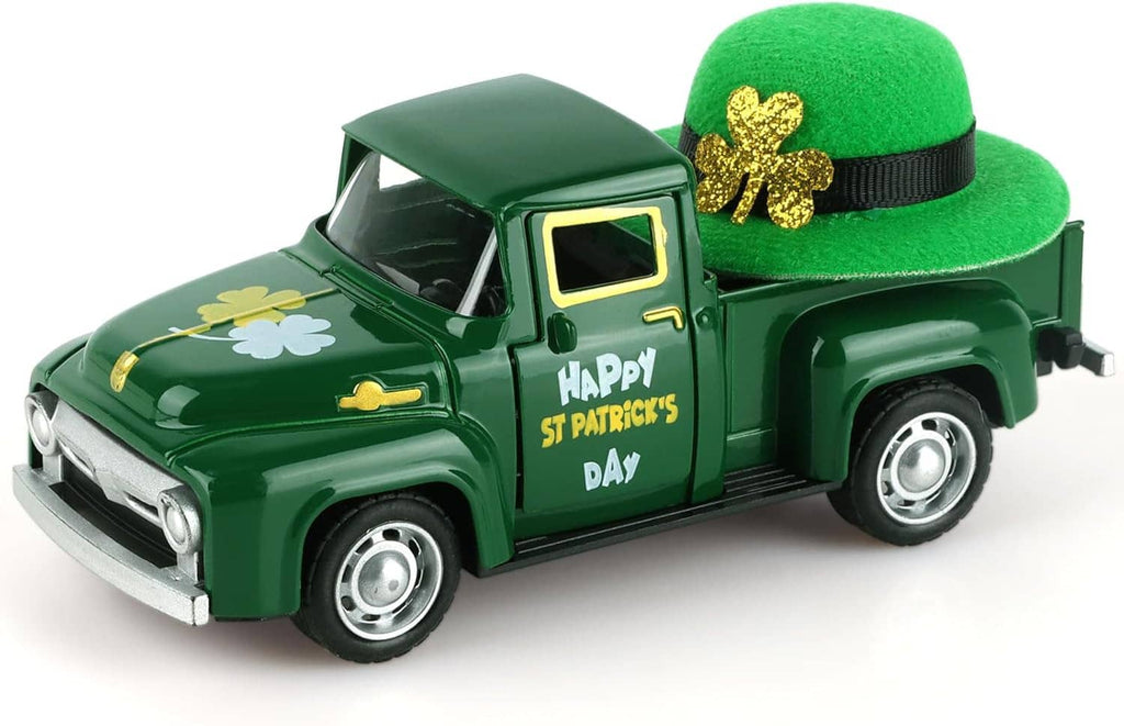 Green mini metal truck with green hat and gold shamrock on top, front-left view.