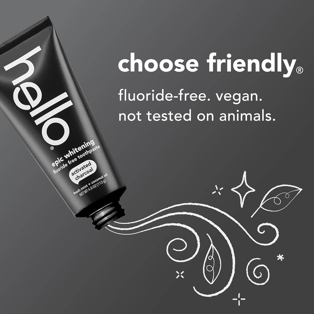 Charcoal toothpaste tube close-up with decorative swirl graphics