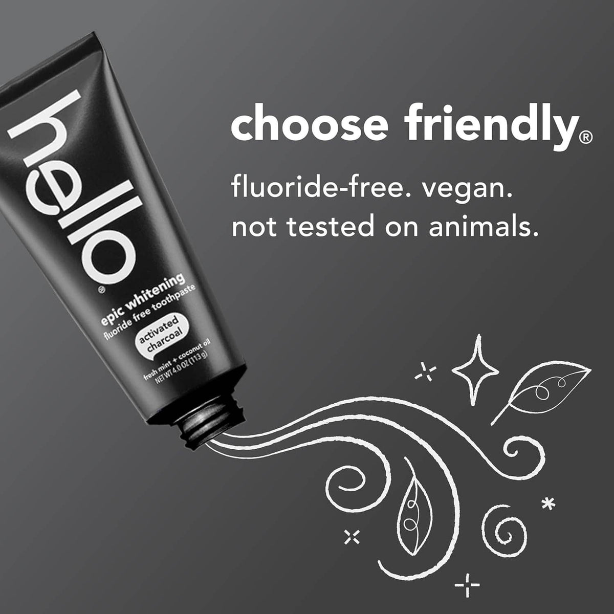 Charcoal toothpaste tube close-up with decorative swirl graphics