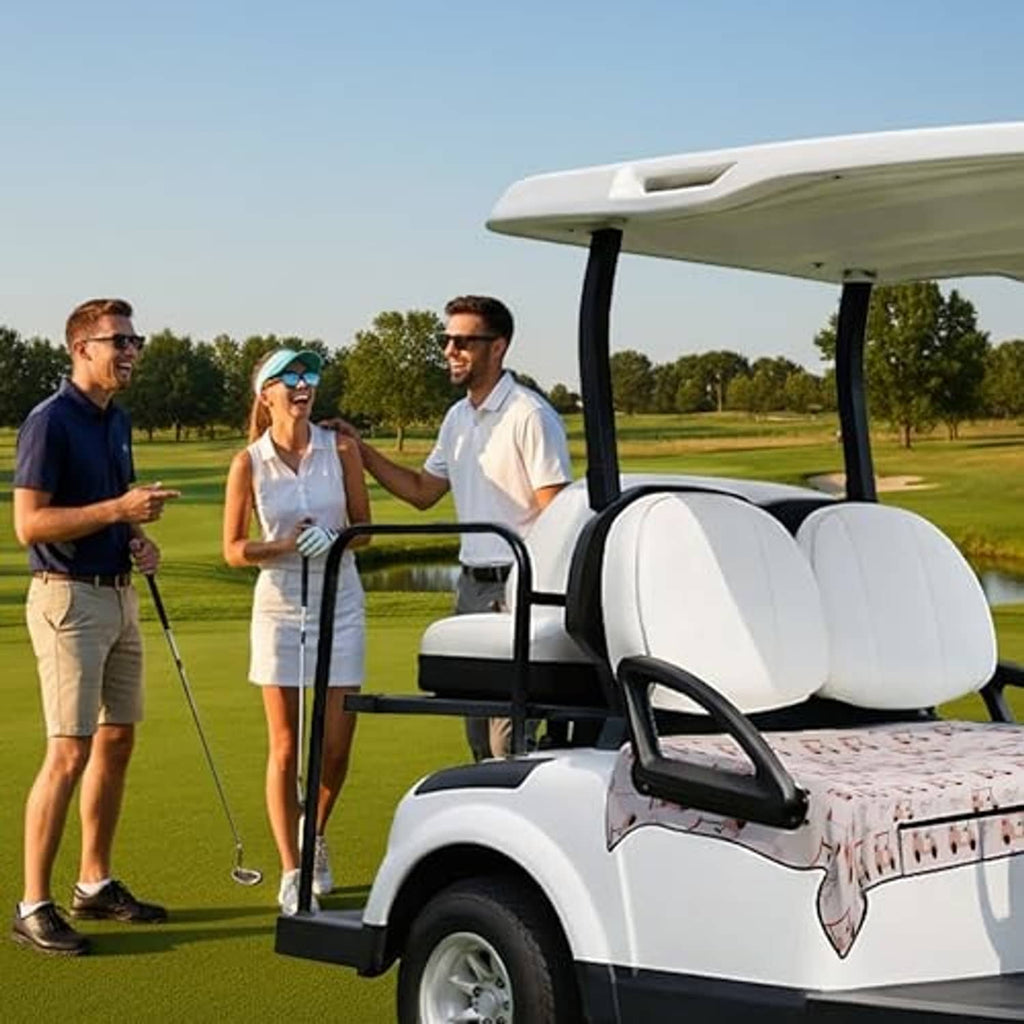 Pink patterned golf cart seat cover on the front bench with black armrests