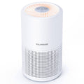 White cylindrical air purifier with perforated grille and FULMINARE control panel on top