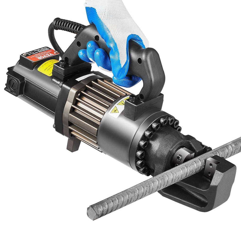 Hydraulic electric rebar cutter with black guard and ribbed rebar in jaws