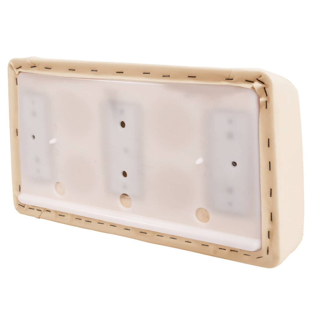 Beige seat backrest cushion panel with cutouts and perforated mounting border