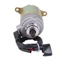 Starter motor with gray housing, iridescent metal body, black wire harness, 9-tooth shaft