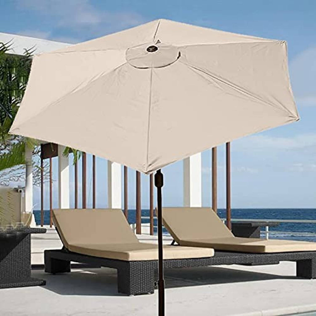 Light cream outdoor umbrella canopy open, showing the central pole attachment