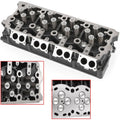 Engine cylinder head with valve springs and ports, silver-gray cast metal assembly.