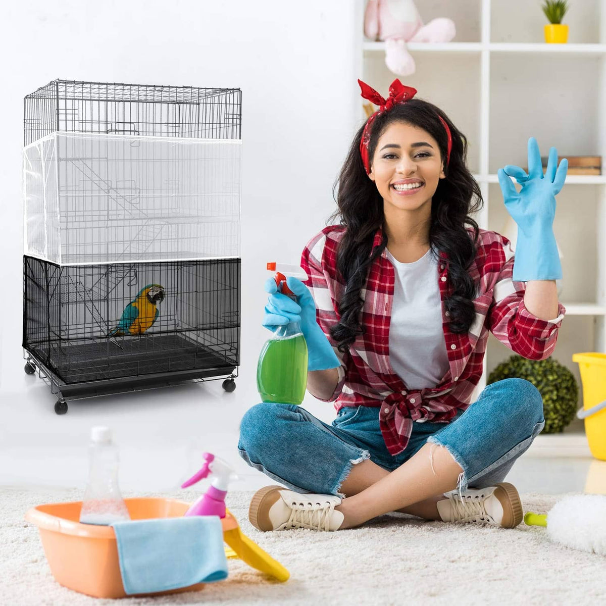 Bird cage with black seed catcher cover net over the lower section, wire frame view