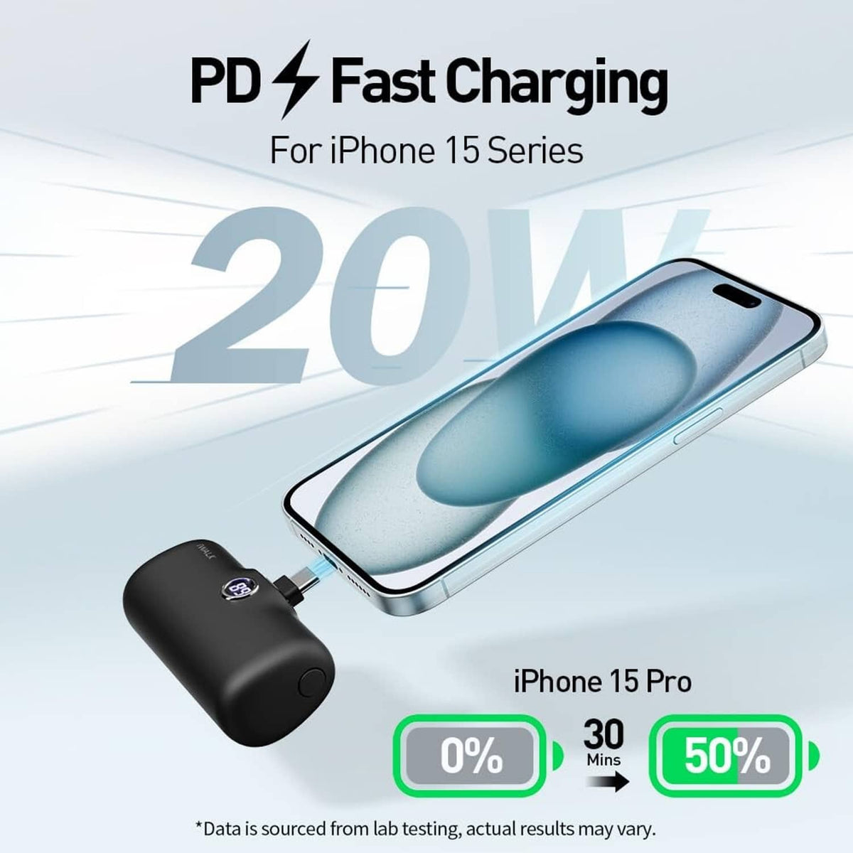 Black USB-C portable charger with attached cable, charging a smartphone