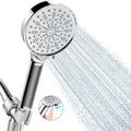 Chrome handheld filtered shower head with round spray face and visible spray jets