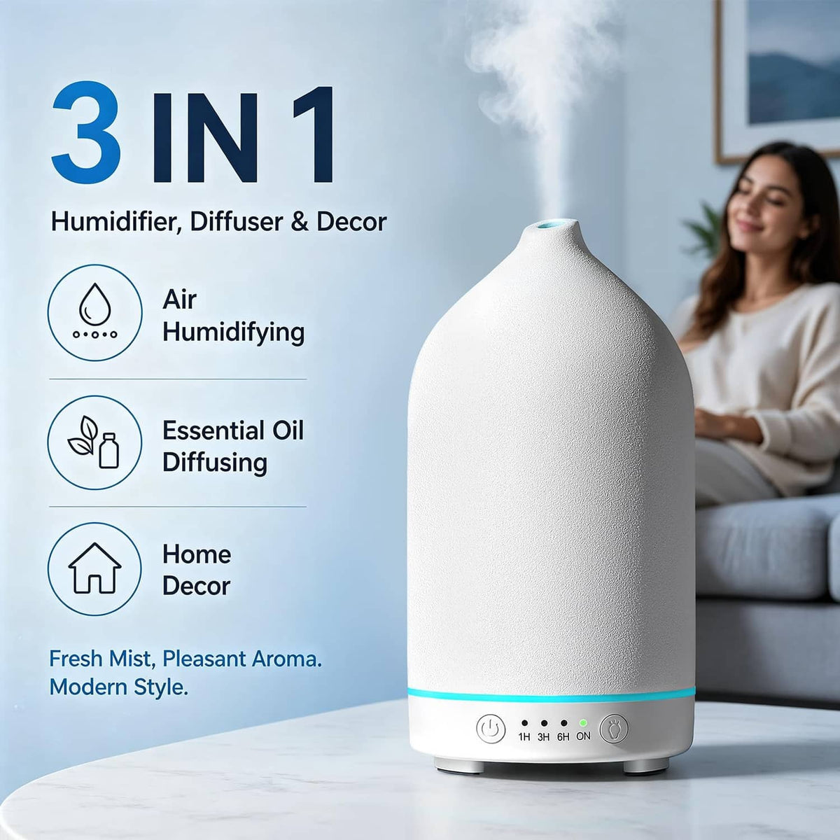 White ceramic essential oil diffuser with blue LED strip, compact base for home use.