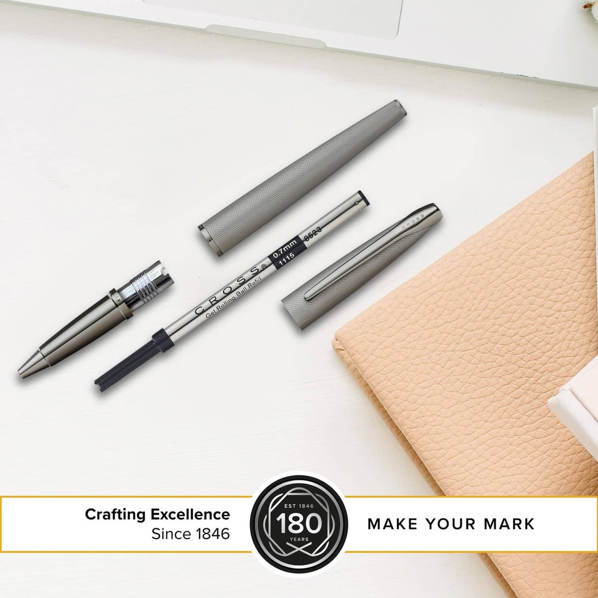Silver gel rollerball pen with black refill cartridge pieces on white