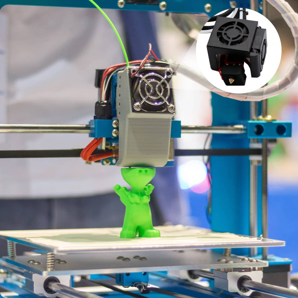 3D printer extruder assembly with black silicone heater block cover installed on hotend