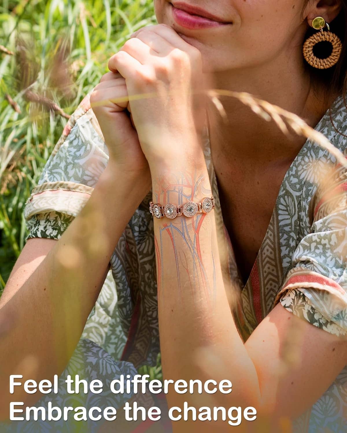 Rose gold bracelet with rhinestone oval links worn on a wrist