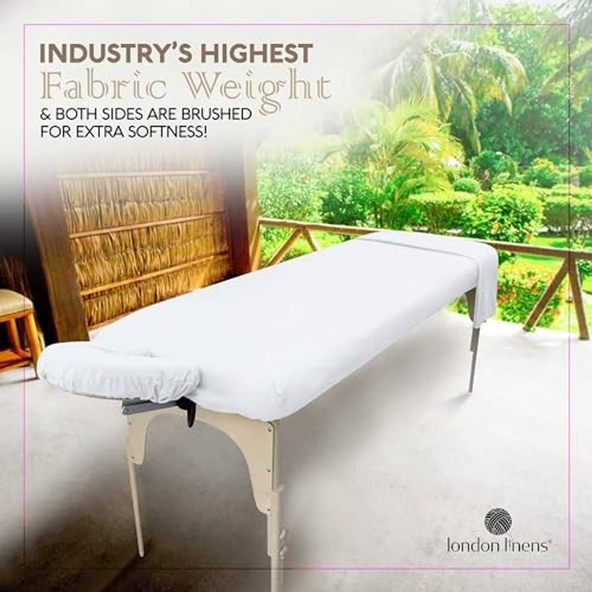 White microfiber massage table cover with fitted skirt and rounded headrest