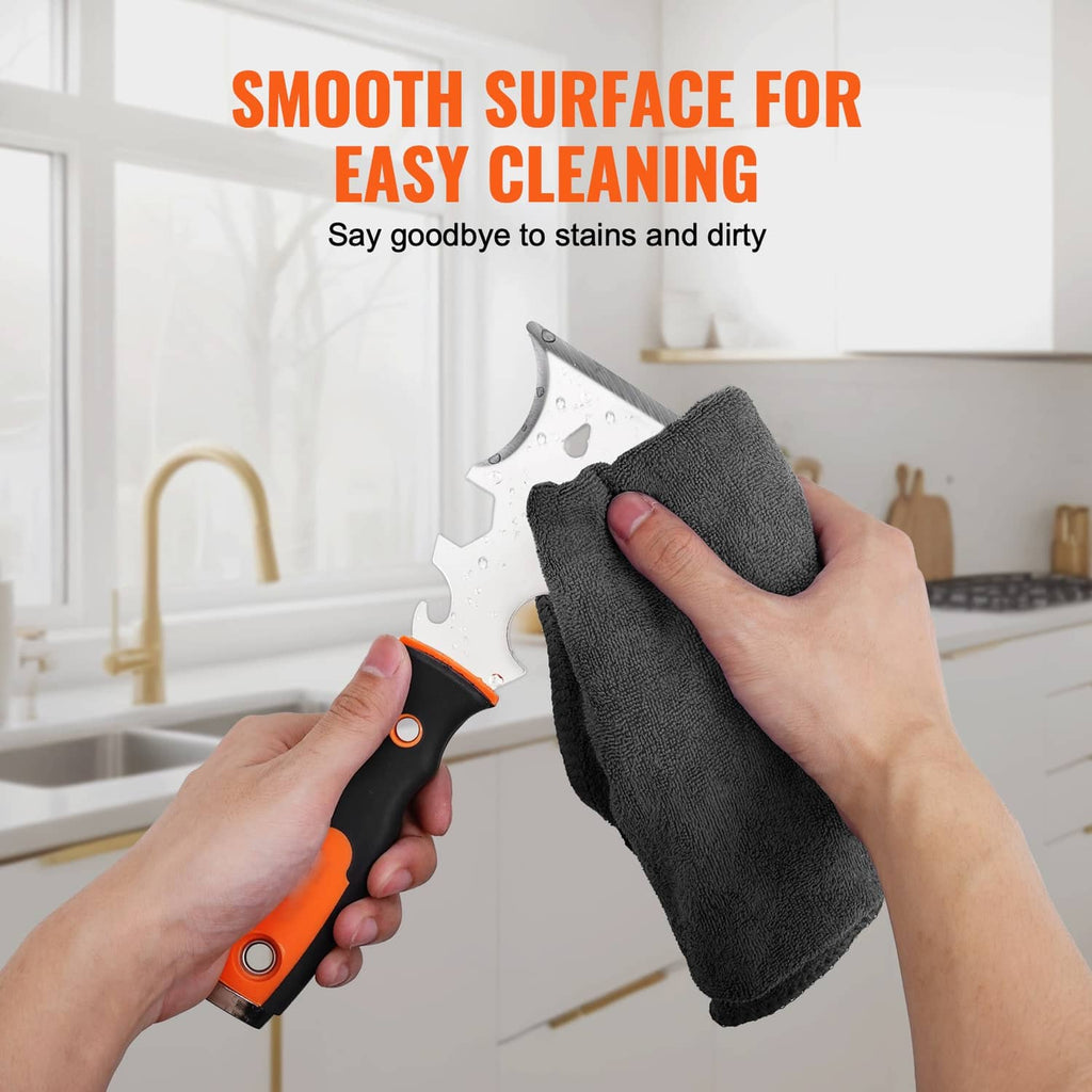 Drywall scraper with orange-black handle wiping a smooth painted surface