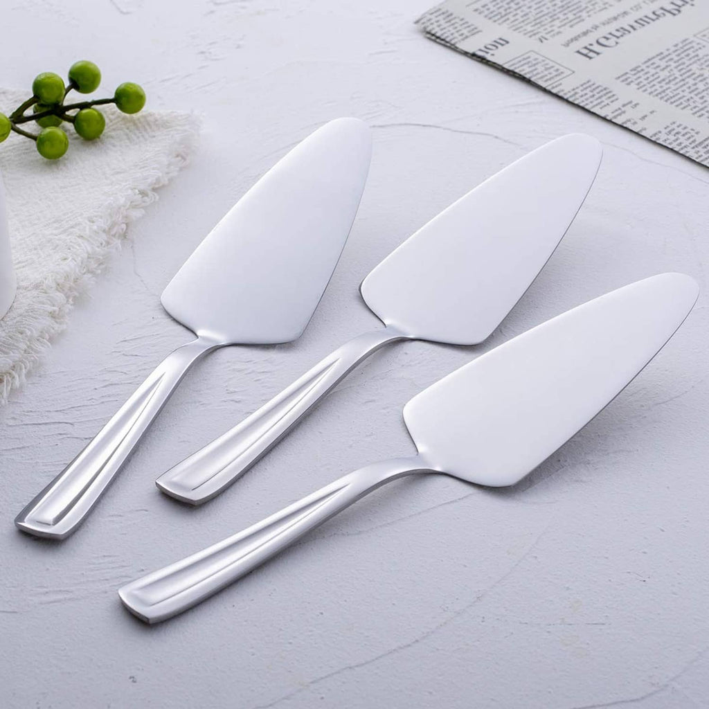 Stainless steel pie cake server trio with white triangular blades and long polished handles
