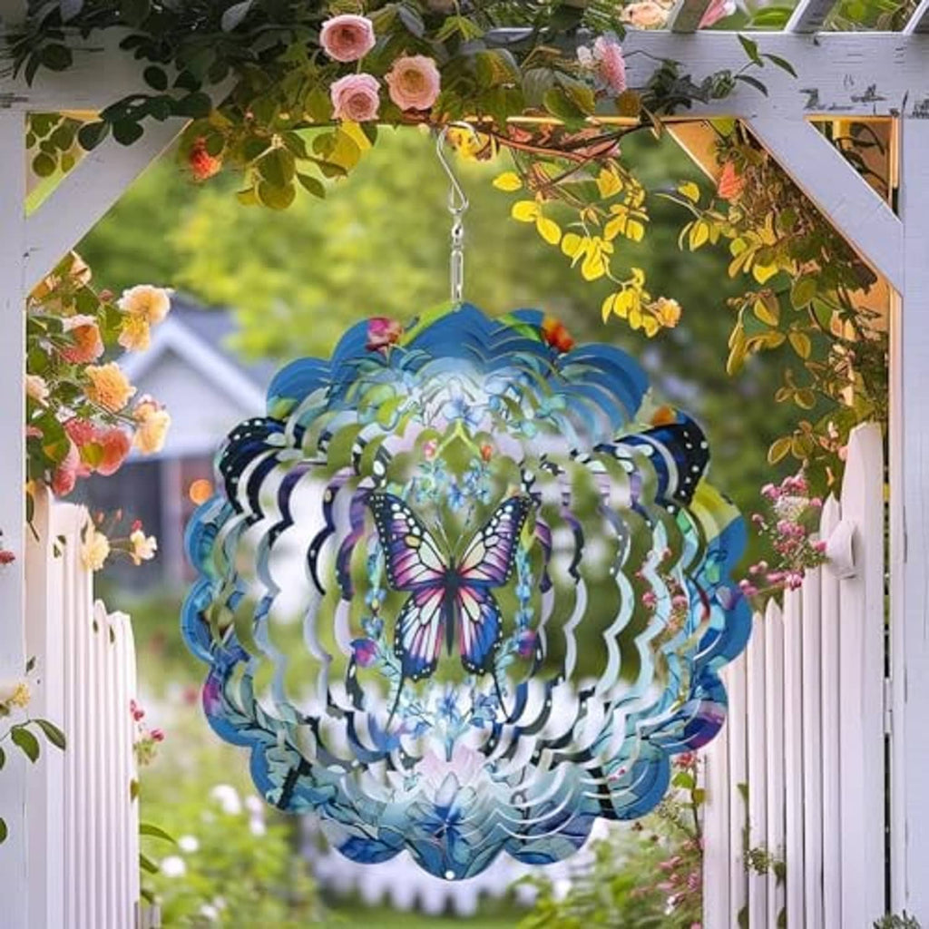 Butterfly wind spinner hanging from a porch with blue and purple layered metal petals