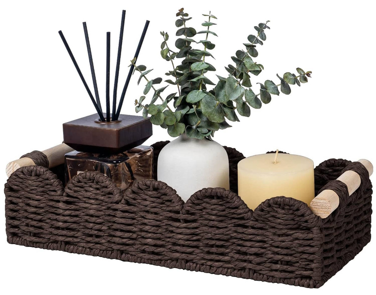 Brown woven toilet paper storage basket with rounded edge and beige rope handles