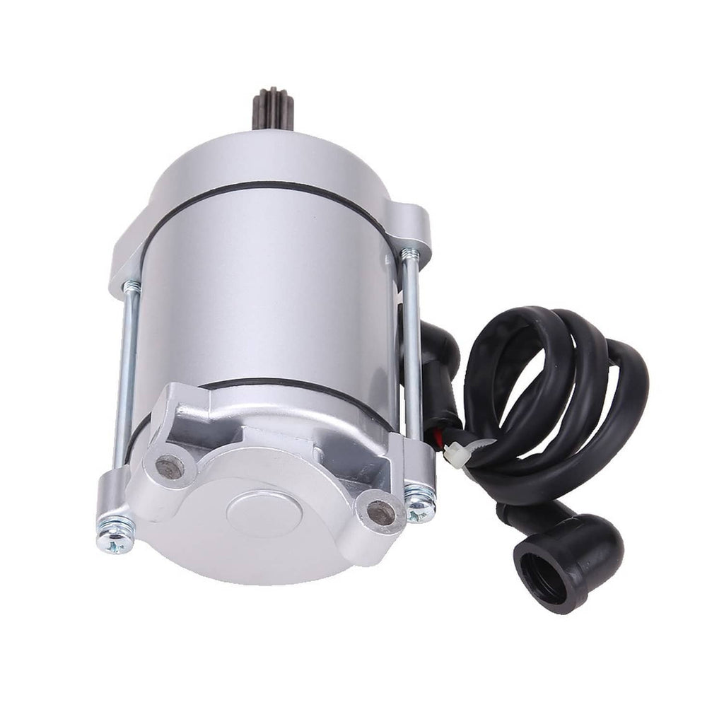 Starter motor assembly top view with round cover and black cable connectors