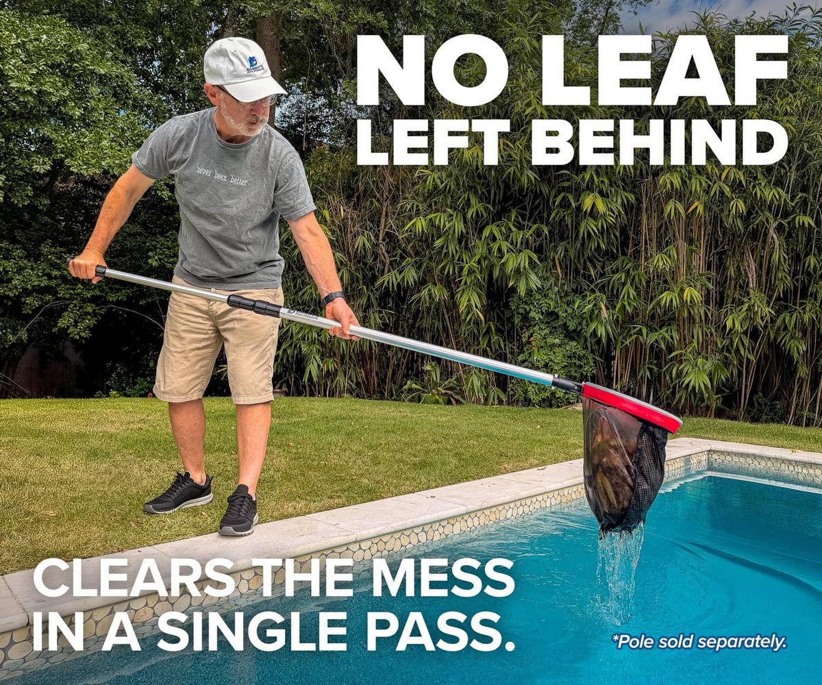 Person using red and black deep bag pool net rake on pool surface to collect debris