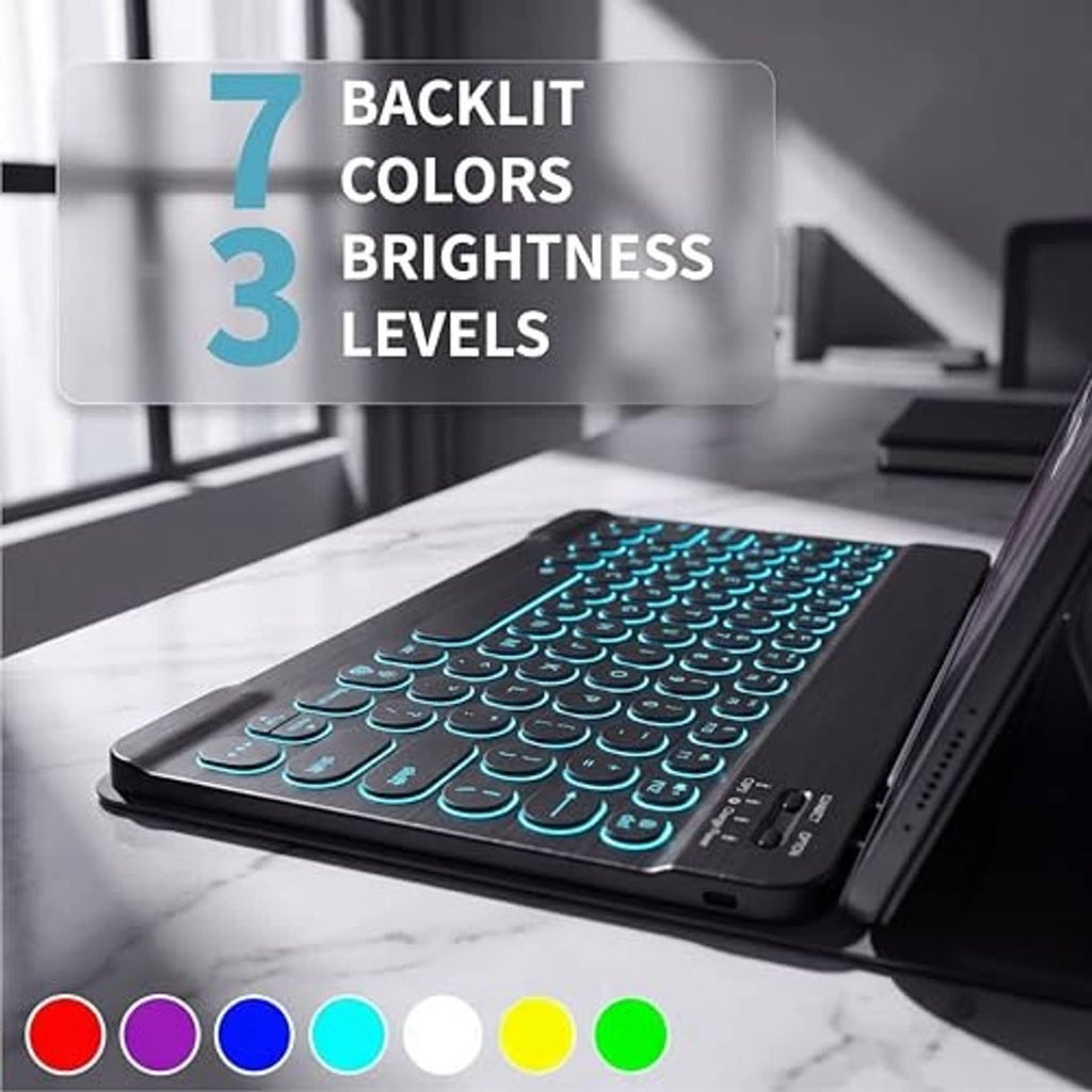 Black tablet keyboard case with glowing backlit keys on a desk surface