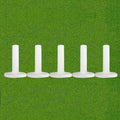 White rubber golf tees, 3.13 in height, five-pack on green grass background
