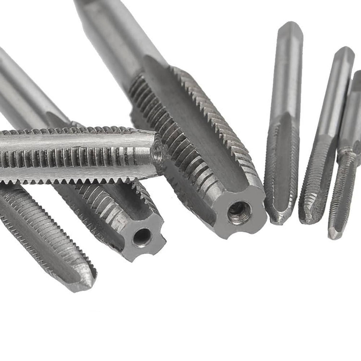 Close-up of metric thread tap ends with helical cutting flutes and threaded teeth