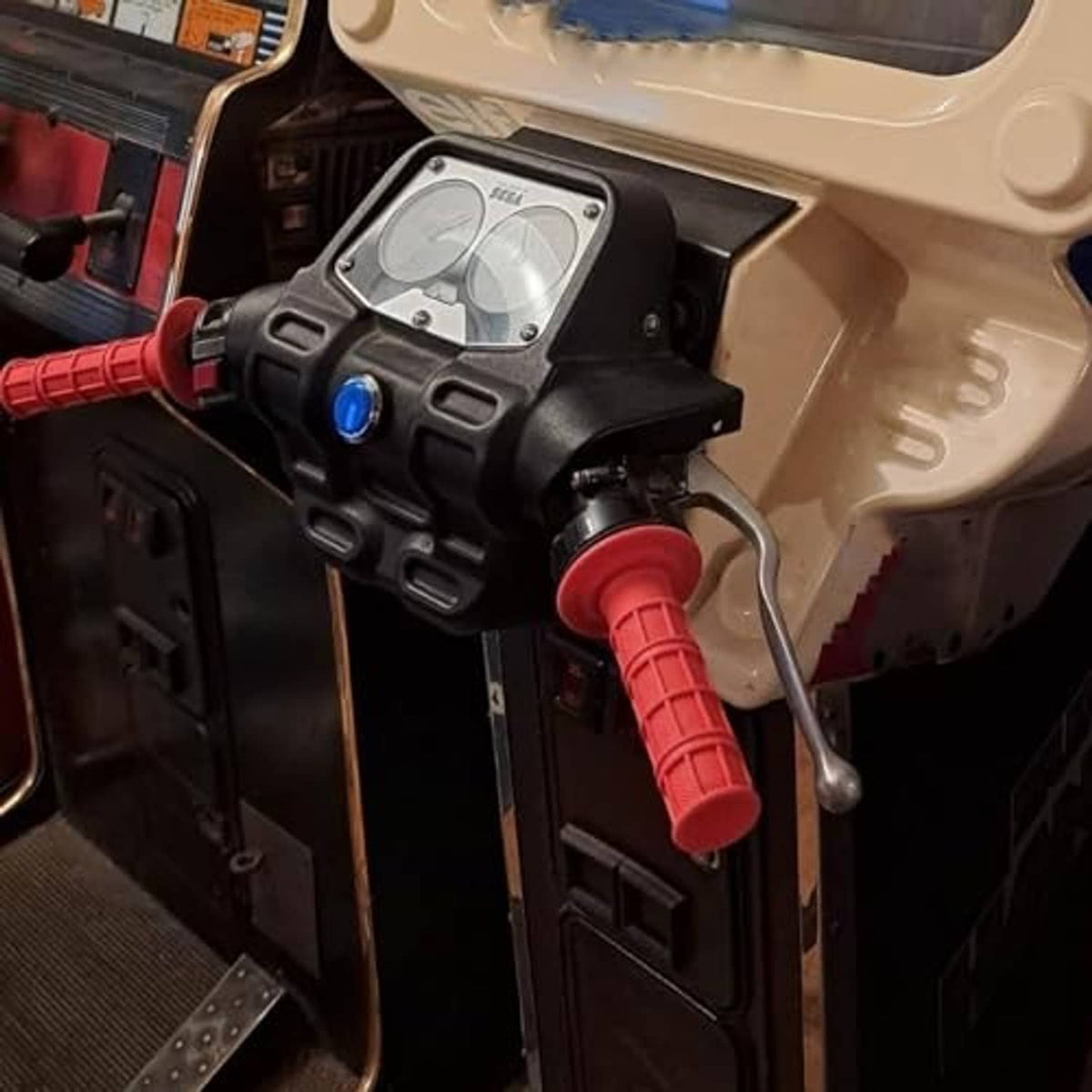 Motorcycle handlebar with red non-slip grips and protective rubber ends