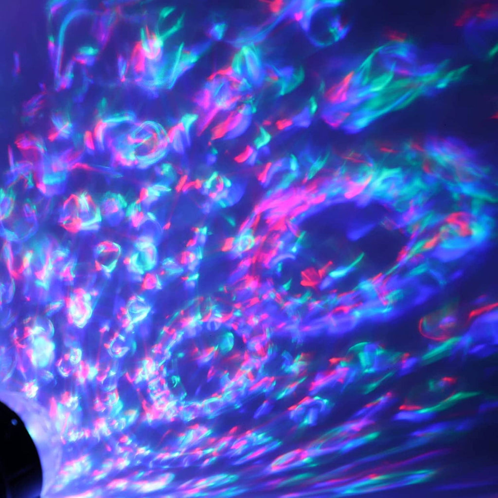 Colorful ocean-wave light beam pattern in blue, purple, and green hues