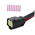 Headlight wiring harness connector plug with black housing and red/black cables