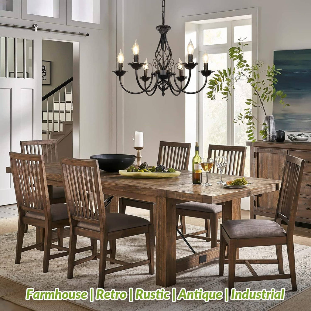 Black 6-light candelabra candle chandelier hanging over dining room table
