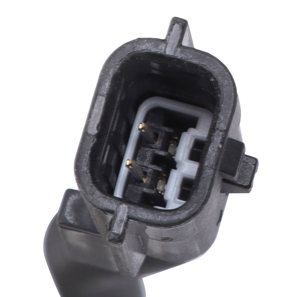 Front shock absorber electrical connector plug with exposed pins in black housing.